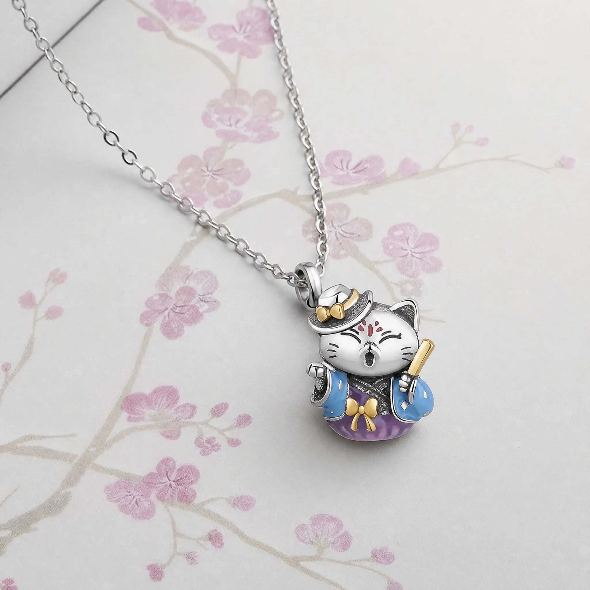 CALEO Japonism lifestyle image - Blue Kimono Lucky Cat Charm - japonism-refbatch-ref09-blue-kimono-lucky-cat-charm - 2026-07-27