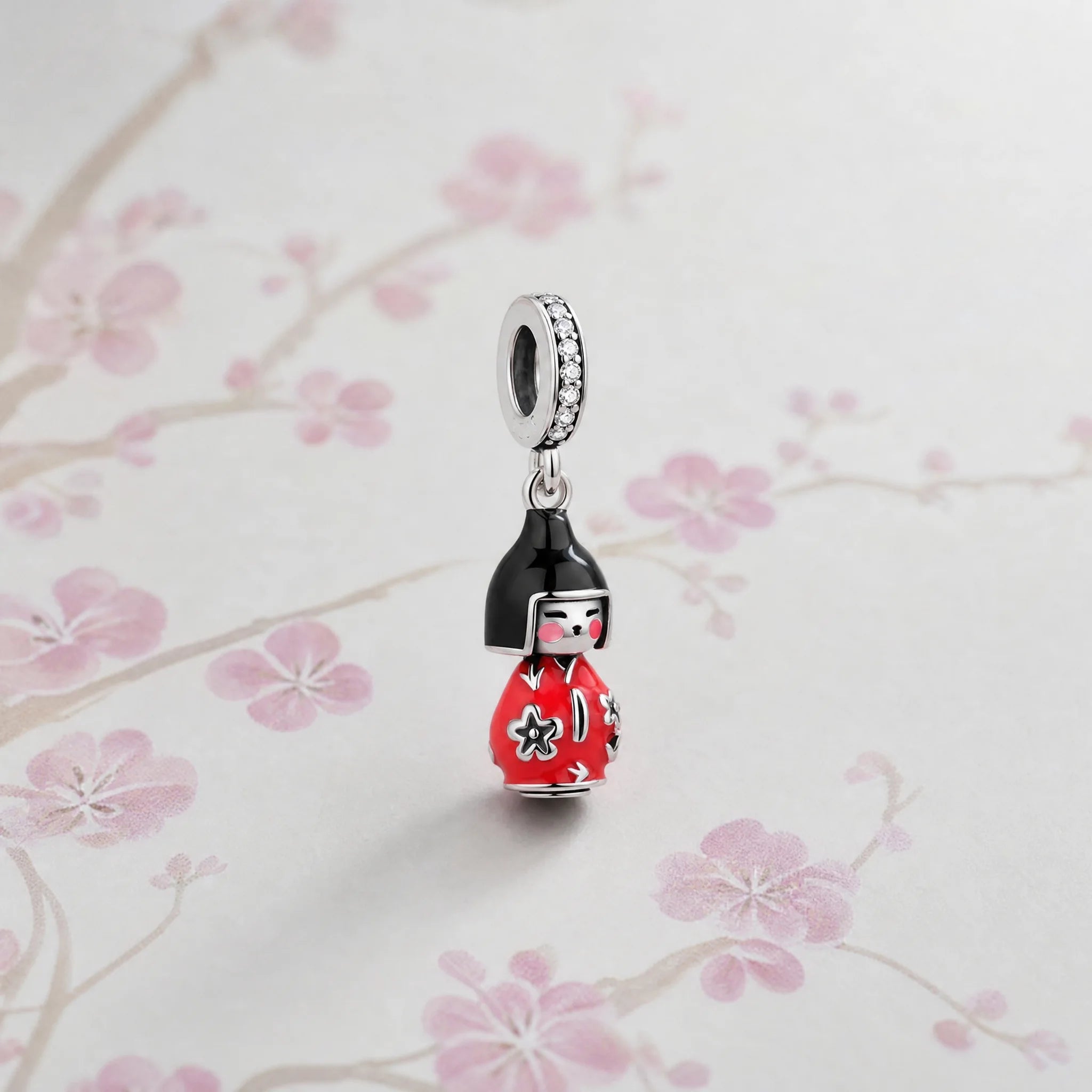 CALEO Japonism lifestyle image - Red Kokeshi Doll Dangle Charm - japonism-refbatch-ref09-red-kokeshi-doll-dangle-charm - 2026-07-27