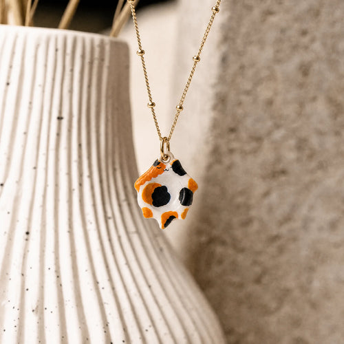 CALEO lifestyle Reference bank random - Calico Patch Cat Pendant Charm - lifestyle-refbank-random-20260727-r44-calico-patch-cat-pendant-charm