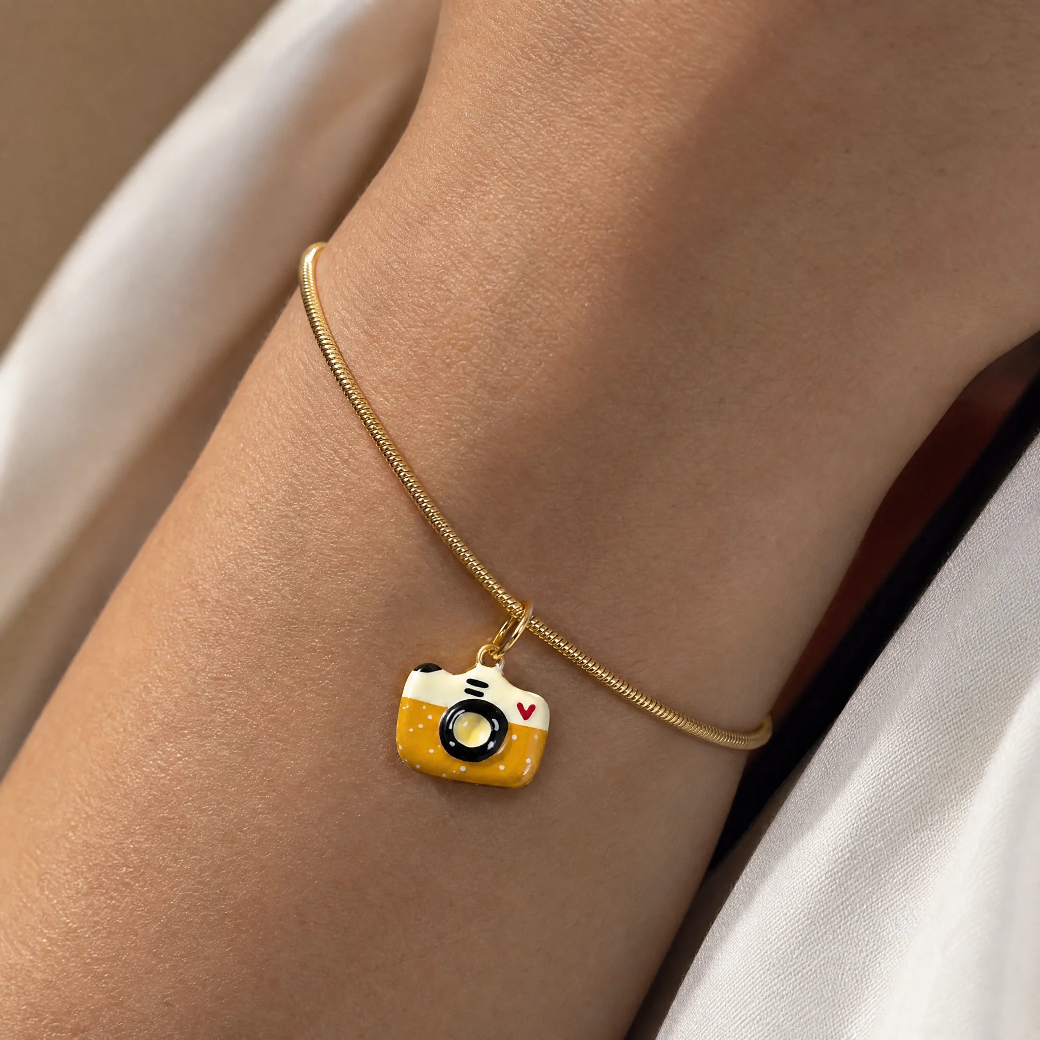 CALEO lifestyle Reference bank random - Camera Pendant Charm - lifestyle-refbank-random-20260727-r46-camera-pendant-charm