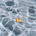 CALEO lifestyle Reference bank random - Golden Surf Dog Pendant Charm - lifestyle-refbank-random-20260727-r58-golden-surf-dog-pendant-charm
