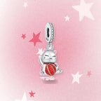 CALEO Japanese charm thumbnail - Lucky Cat Yarn Ball Dangle Charm - pink star background - 2026-07-22