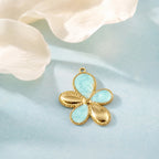 CALEO Nature & Flowers color-matched lifestyle image - Gold Blue Petal Flower Pendant Charm - nature-flowers-color-blue-ref05-gold-blue-petal-flower-pendant-charm - 2026-07-27