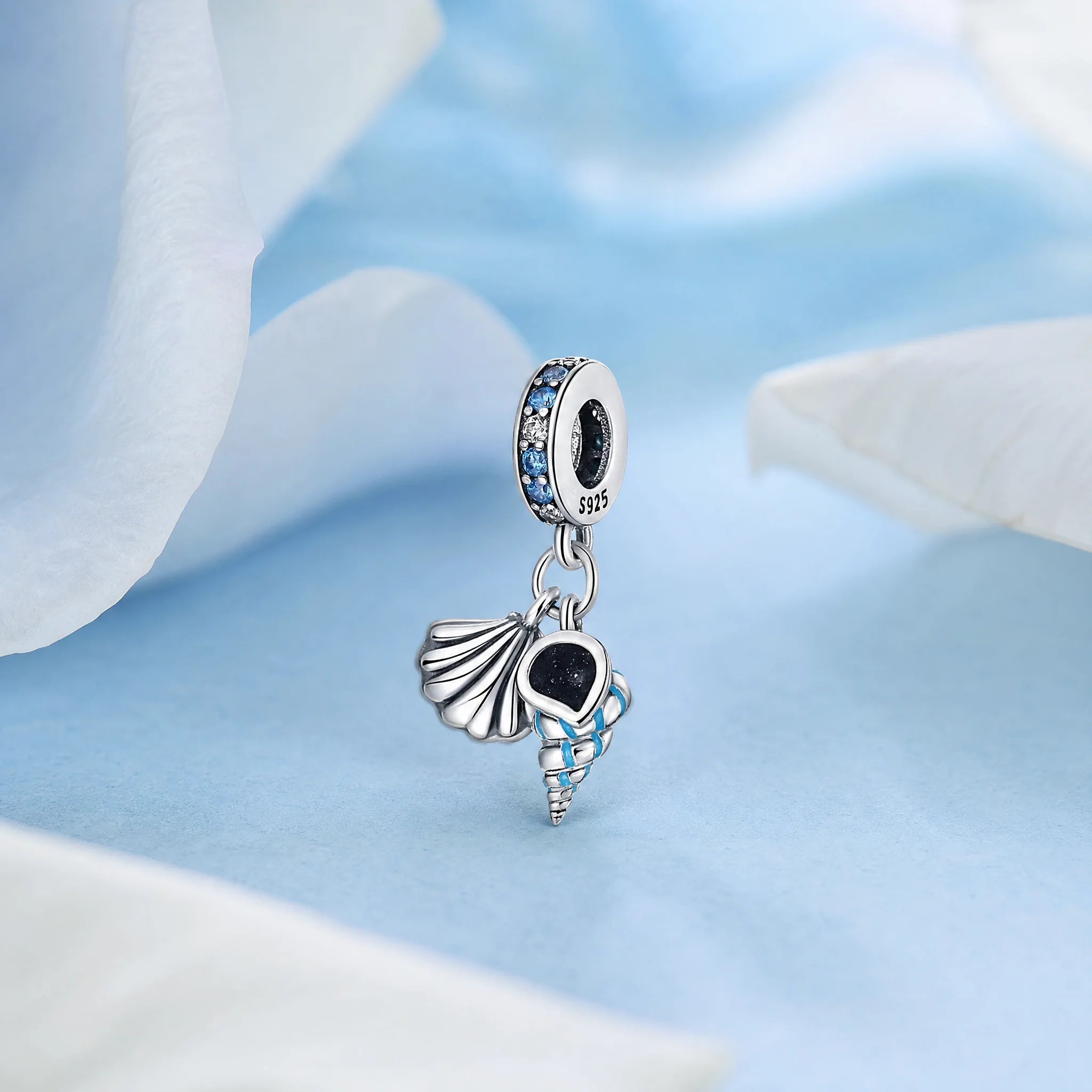 CALEO Nature & Flowers color-matched lifestyle image - Seashell & Mermaid Tail Dangle Charm - nature-flowers-color-blue-ref05-seashell-mermaid-tail-dangle-charm - 2026-07-27