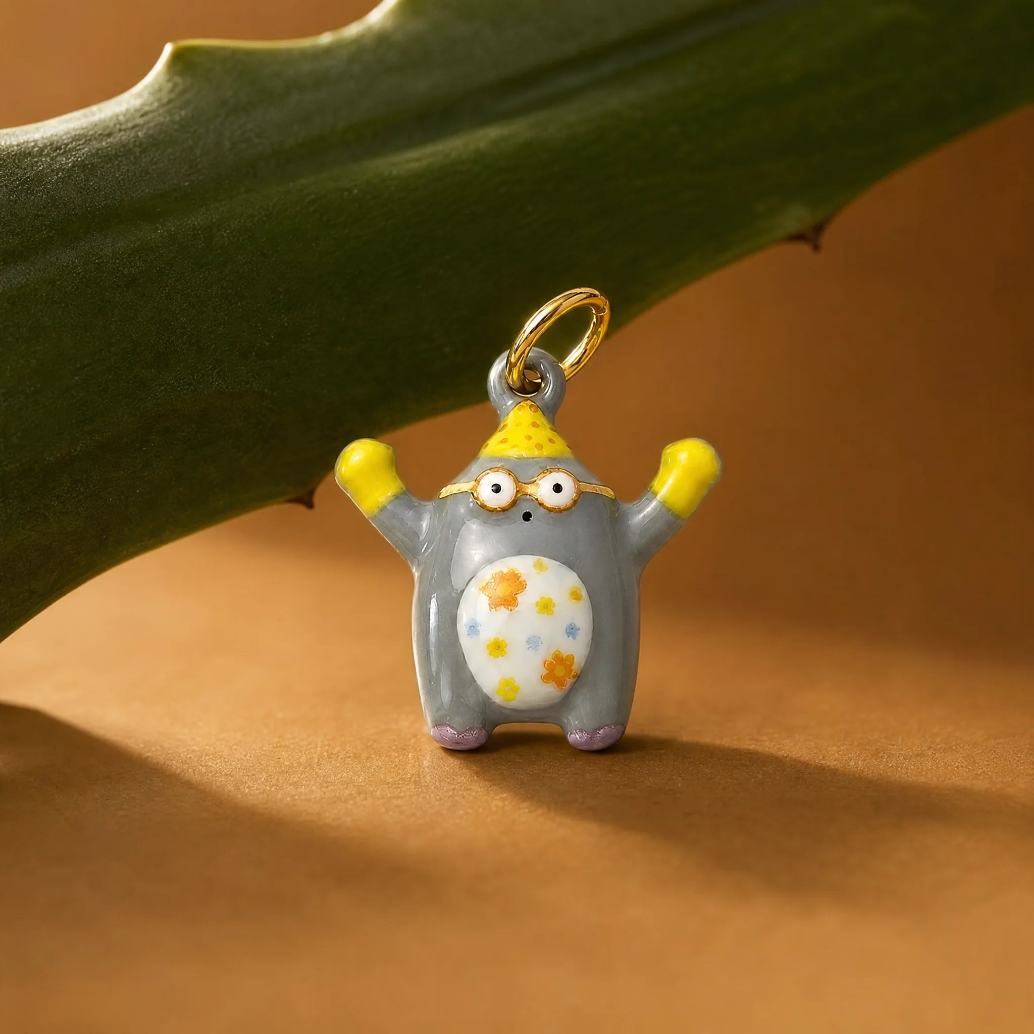 CALEO Nature & Flowers color-matched lifestyle image - Owl Pendant Charm - nature-flowers-color-gold-ref24-owl-pendant-charm - 2026-07-27