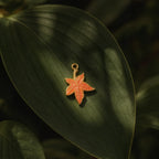CALEO Nature & Flowers color-matched lifestyle image - Amber Maple Leaf Charm Set - nature-flowers-color-green-ref26-amber-maple-leaf-charm-set - 2026-07-27