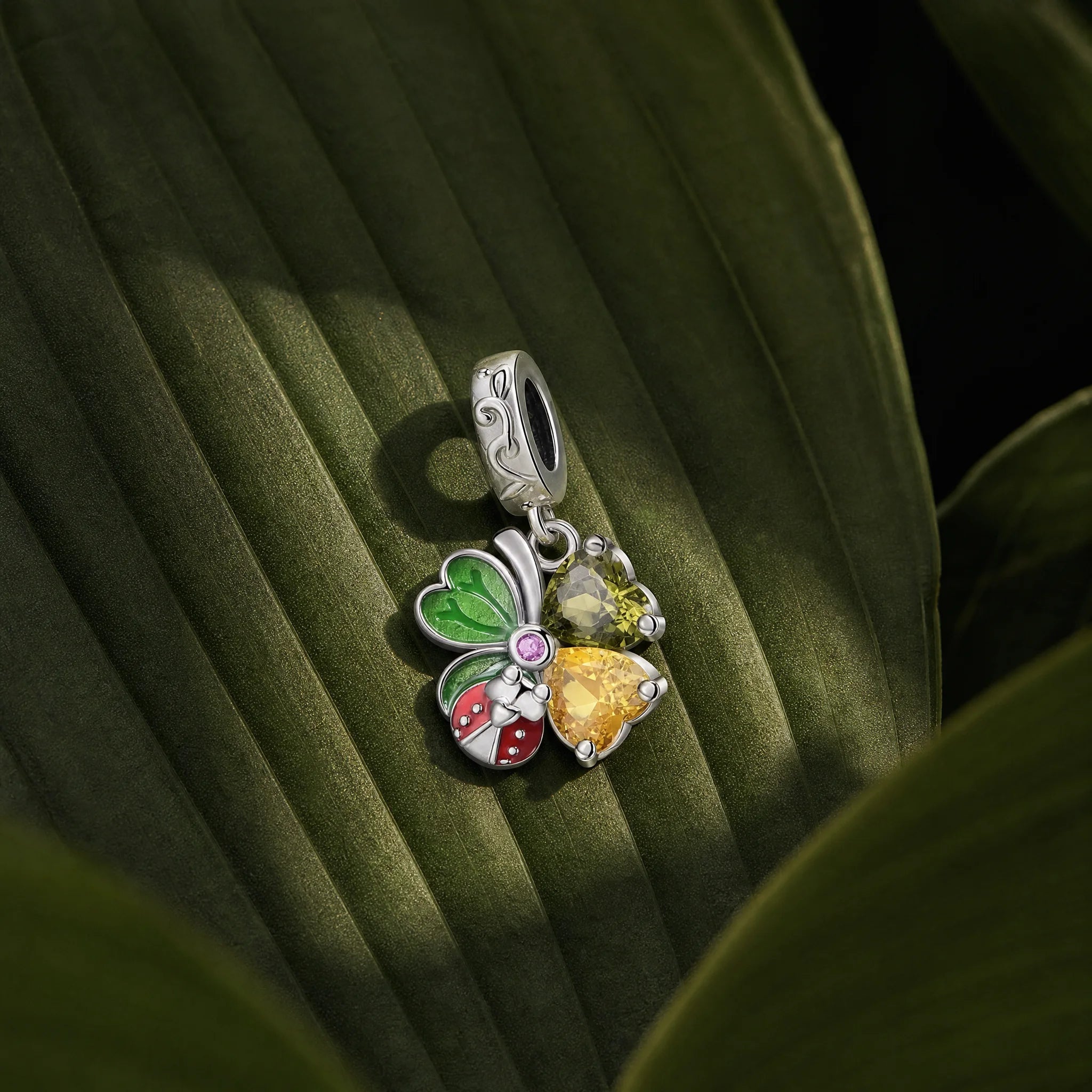 CALEO Nature & Flowers color-matched lifestyle image - Four-Leaf Clover & Ladybug Dangle Charm - nature-flowers-color-green-ref26-four-leaf-clover-ladybug-dangle-charm - 2026-07-27