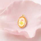 CALEO Nature & Flowers color-matched lifestyle image - Gold Peach Flower Pendant Charm - nature-flowers-color-pink-ref06-gold-peach-flower-pendant-charm - 2026-07-27