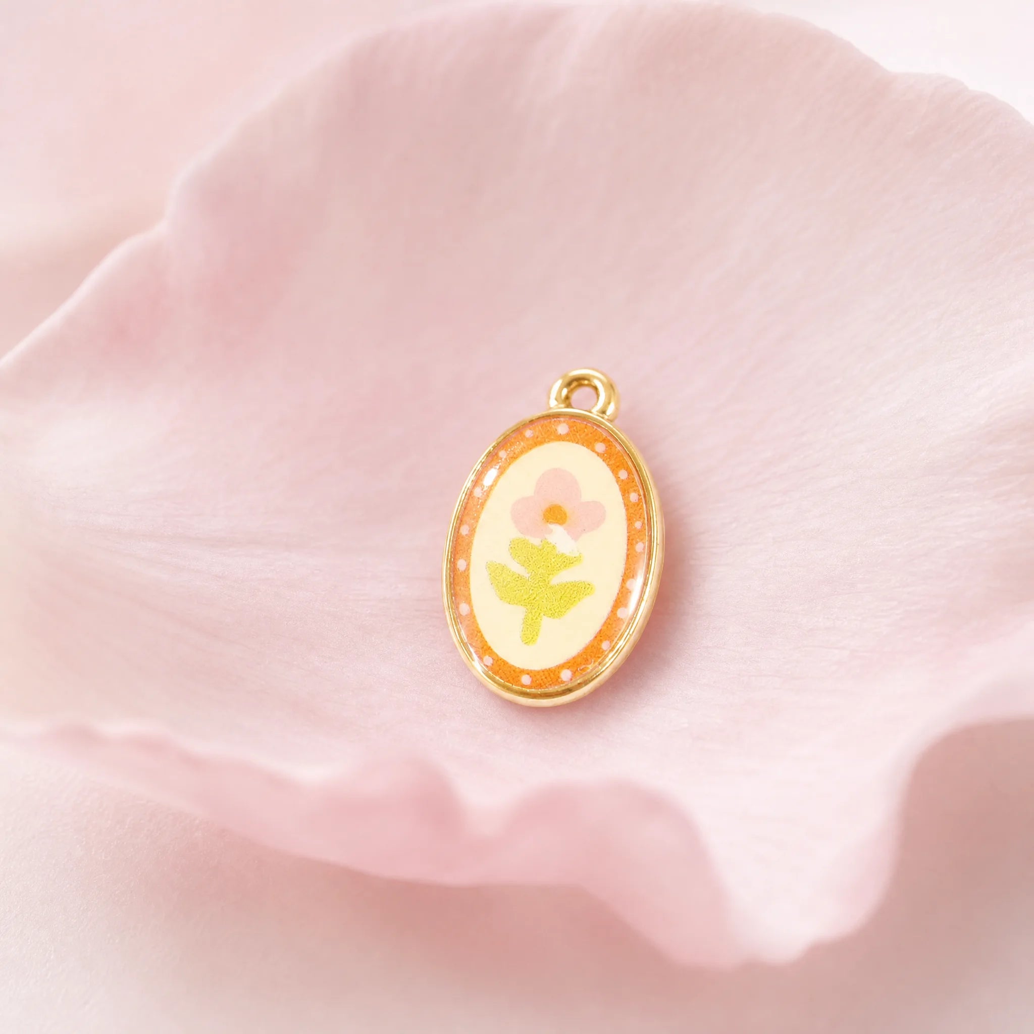 CALEO Nature & Flowers color-matched lifestyle image - Gold Peach Flower Pendant Charm - nature-flowers-color-pink-ref06-gold-peach-flower-pendant-charm - 2026-07-27