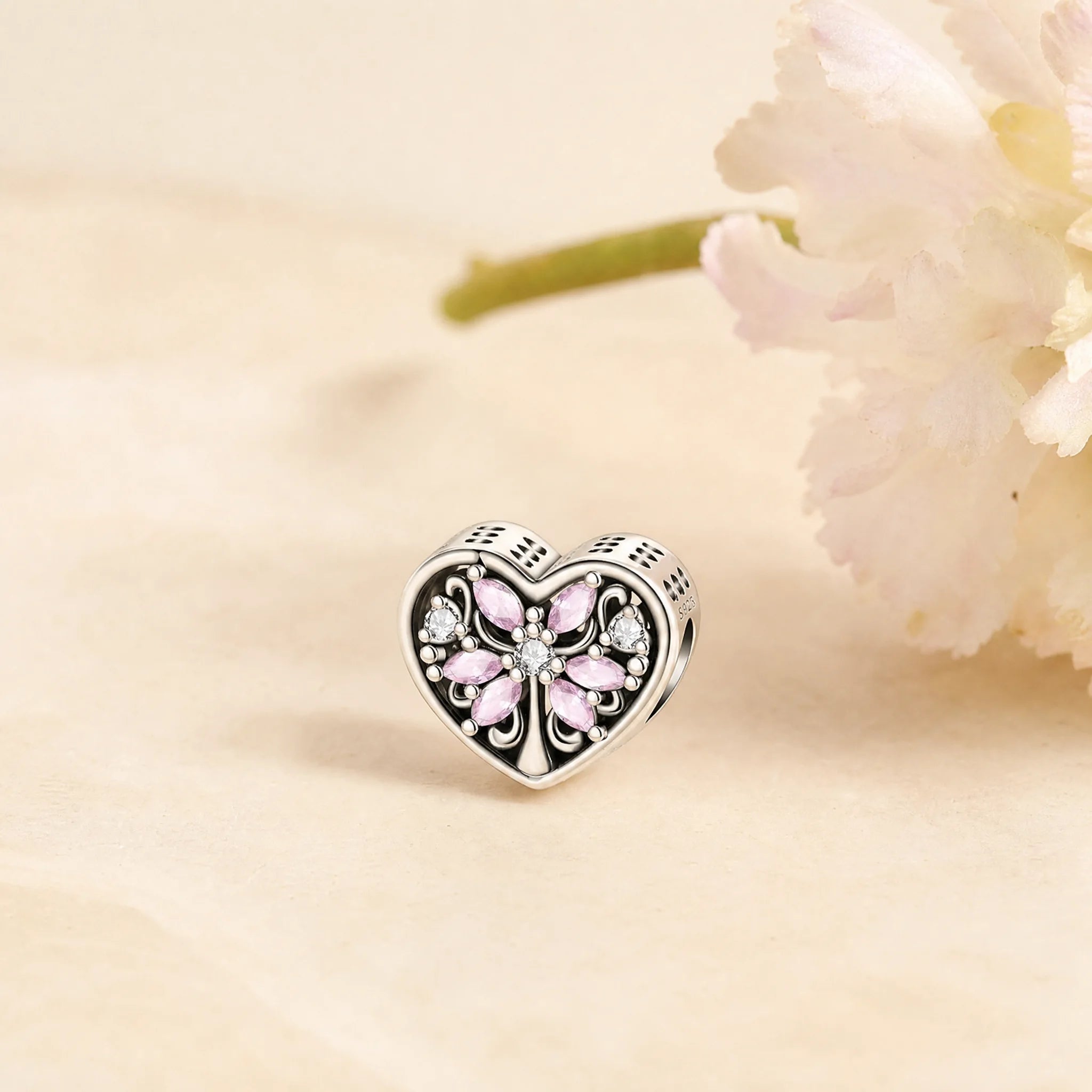 CALEO Nature & Flowers color-matched lifestyle image - Pink Butterfly Heart Bead Charm - nature-flowers-color-pink-ref10-pink-butterfly-heart-bead-charm - 2026-07-27