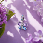CALEO Nature & Flowers color-matched lifestyle image - Purple & Blue Butterfly Cluster Charm - nature-flowers-color-purple-ref20-purple-blue-butterfly-cluster-charm - 2026-07-27
