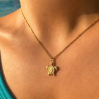 CALEO ocean lifestyle image - Gold Sea Turtle Dangle Charm - ocean-extra-ref04-gold-sea-turtle-dangle-charm - 2026-07-23