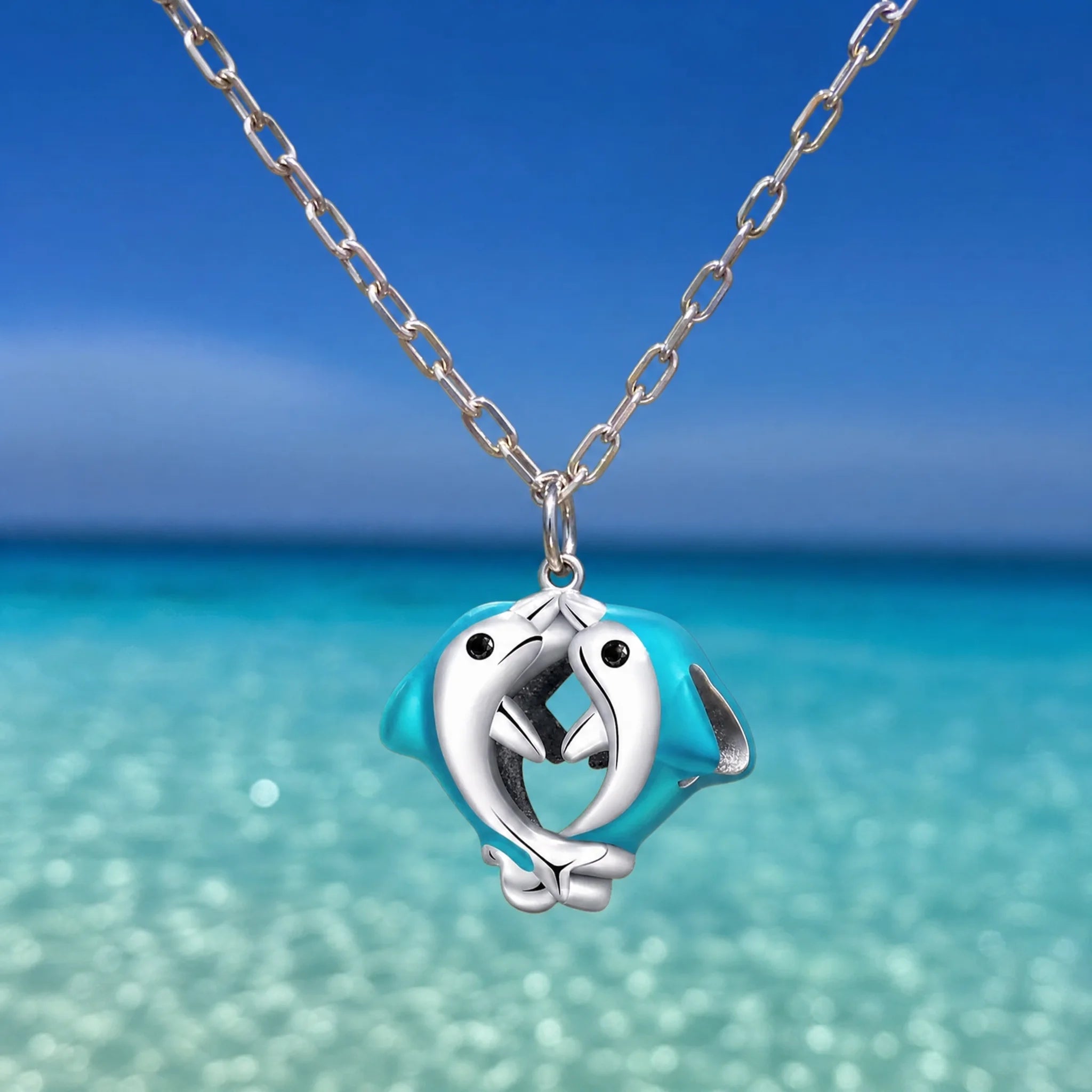 CALEO ocean lifestyle image - Dolphin Duo Ring Charm - ocean-extra-ref05-dolphin-duo-ring-charm - 2026-07-23