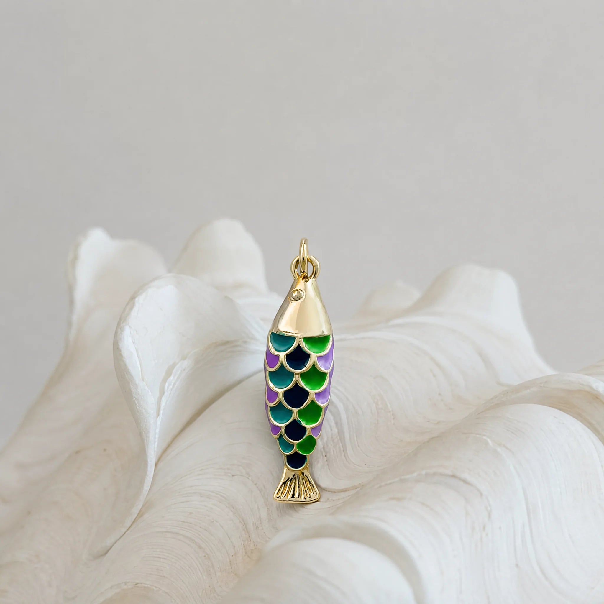 CALEO ocean lifestyle image - Gold Green Scale Fish Pendant Charm - ocean-extra-ref08-gold-green-scale-fish-pendant-charm - 2026-07-23