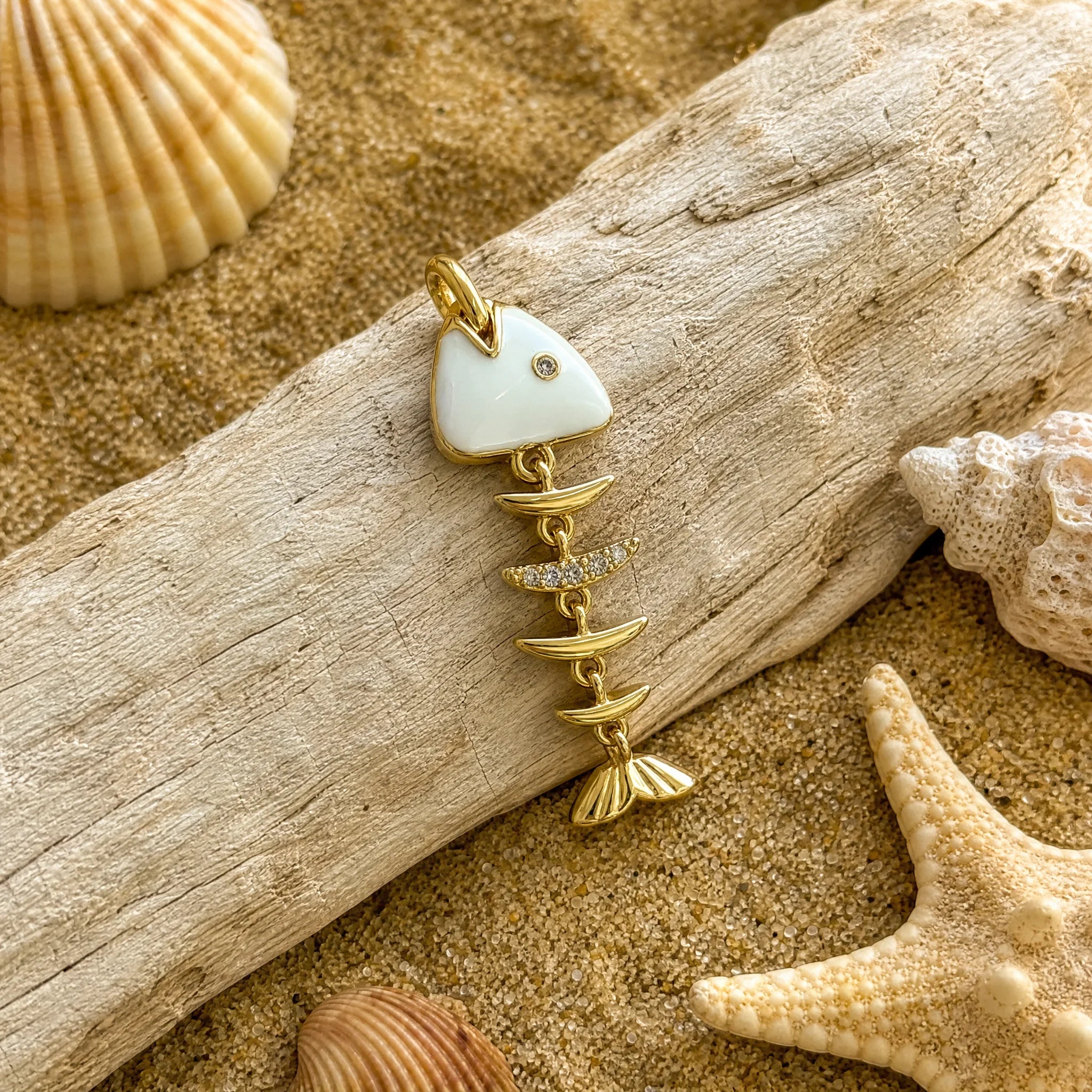 CALEO ocean lifestyle image - Gold Blue Fishbone Pendant Charm - ocean-extra-ref09-gold-blue-fishbone-pendant-charm - 2026-07-23