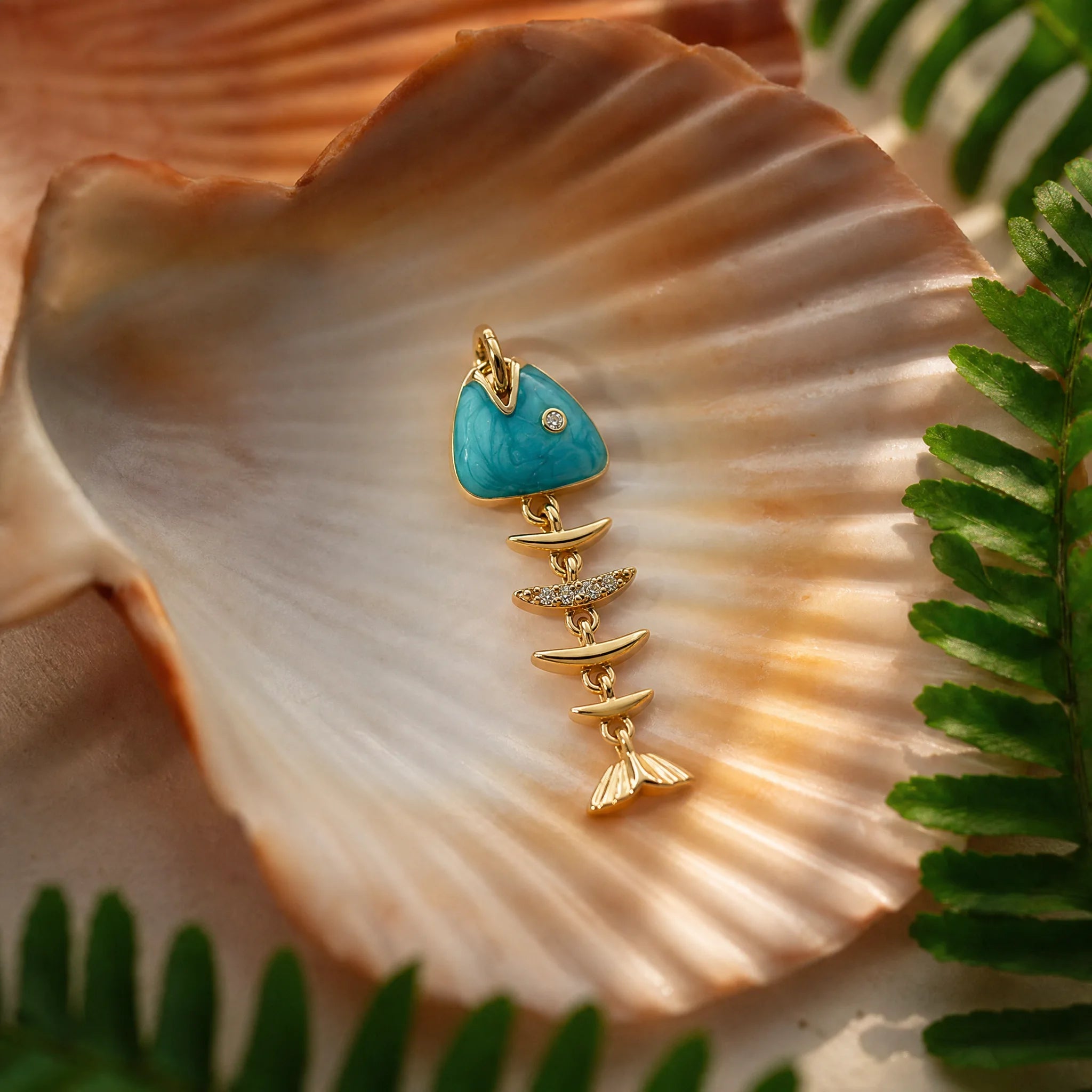 CALEO ocean lifestyle image - Gold Turquoise Fishbone Pendant Charm - ocean-extra-ref10-gold-turquoise-fishbone-pendant-charm - 2026-07-23