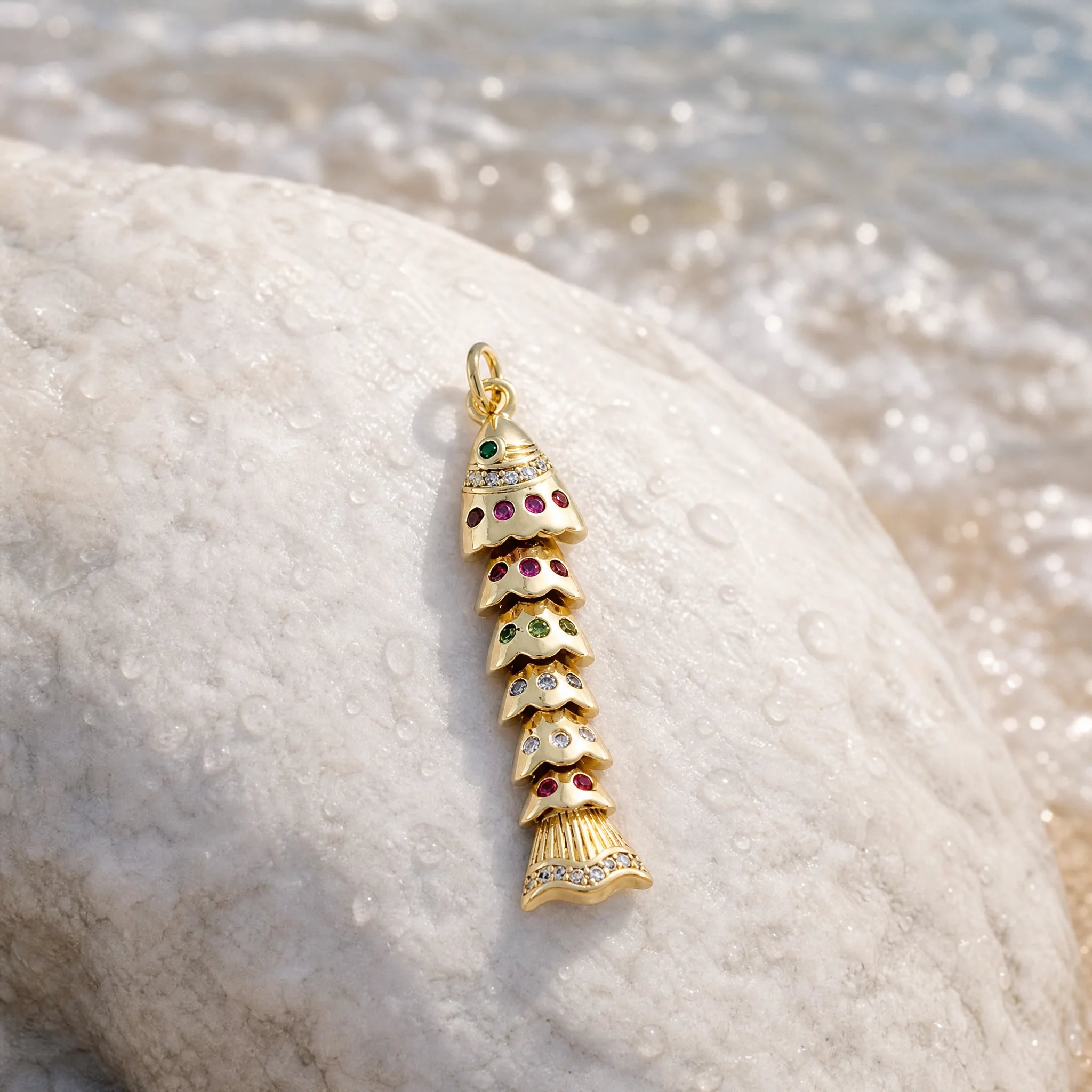 CALEO ocean lifestyle image - Gold Fishbone Pendant Charm - ocean-extra-ref12-gold-fishbone-pendant-charm - 2026-07-23
