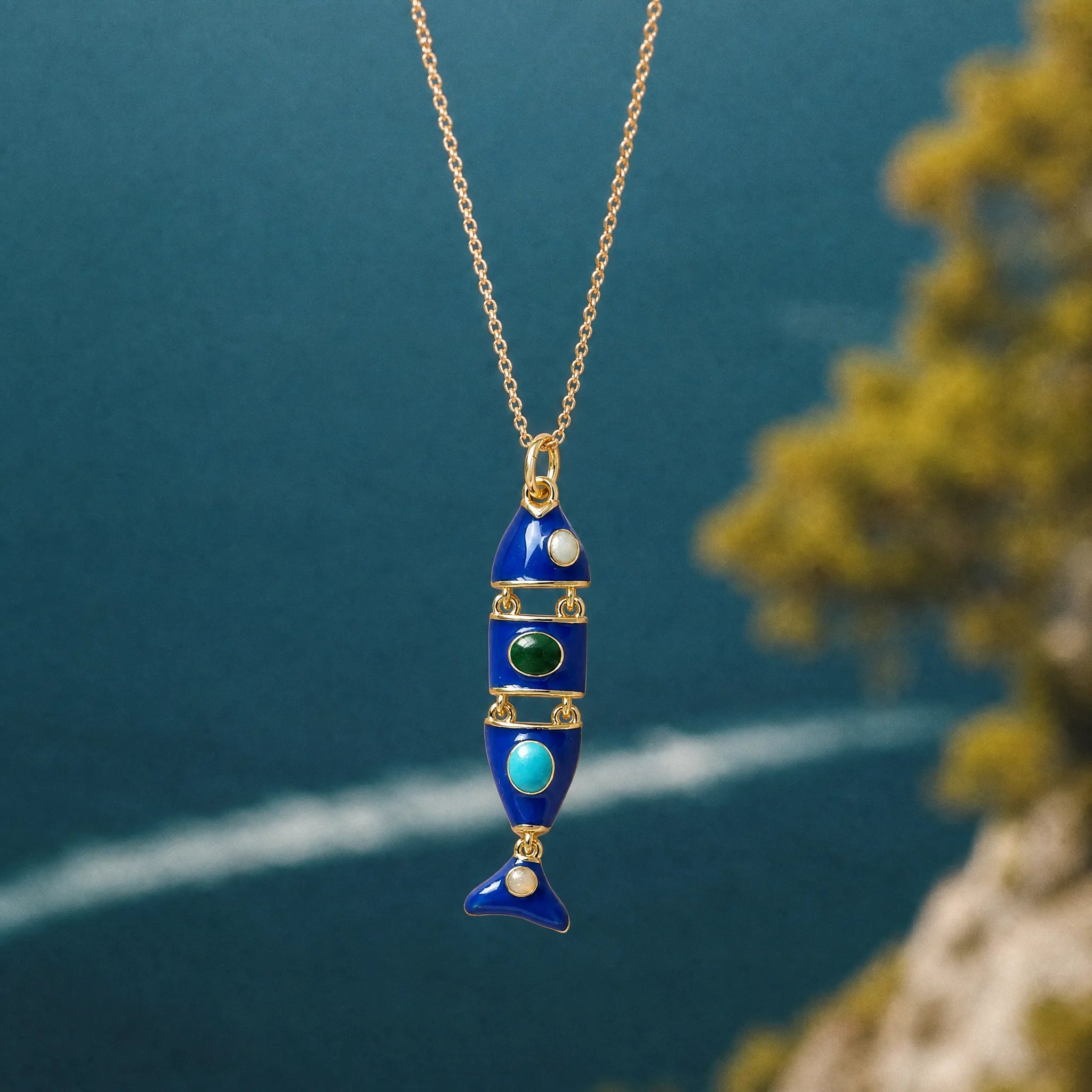 CALEO ocean lifestyle image - Gold Blue Fish Pendant Charm - ocean-extra-ref13-gold-blue-fish-pendant-charm - 2026-07-23