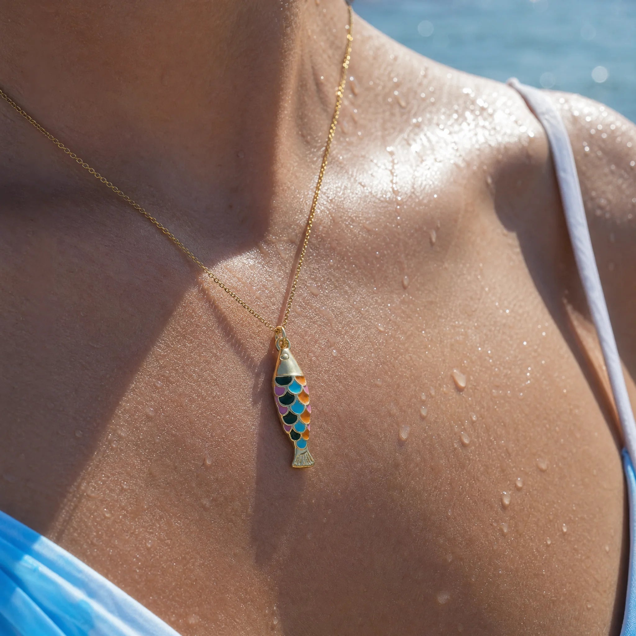 CALEO ocean lifestyle image - Gold Multicolor Fish Pendant Charm - ocean-extra-ref15-gold-multicolor-fish-pendant-charm - 2026-07-23