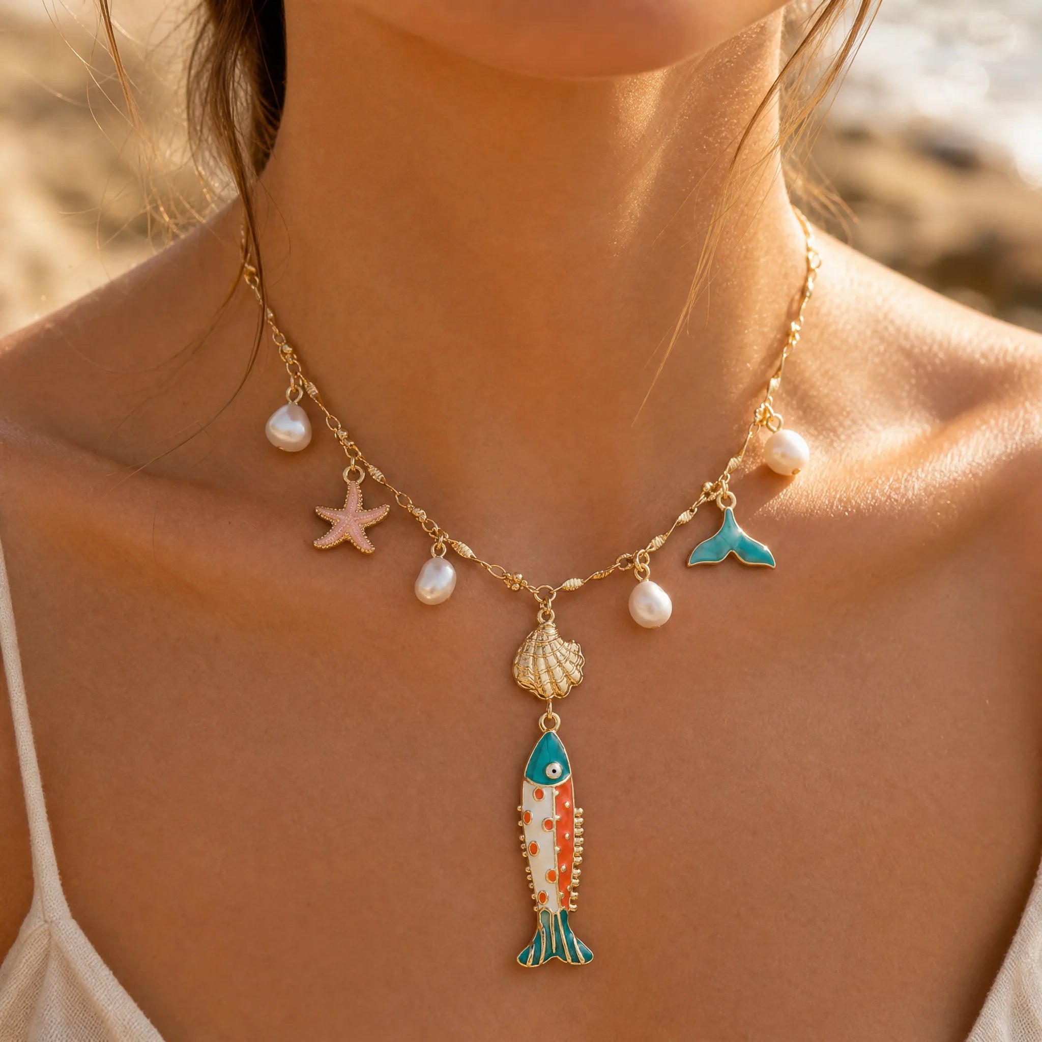 CALEO ocean lifestyle image - Gold Turquoise Fish Pendant Charm - ocean-extra-ref17-gold-turquoise-fish-pendant-charm - 2026-07-23