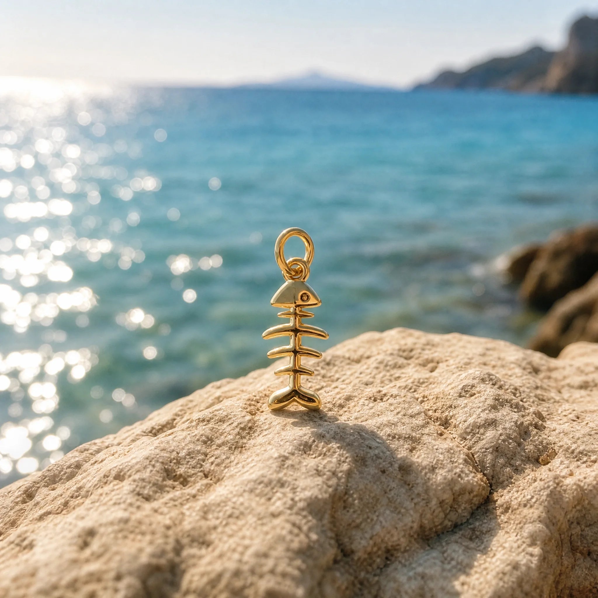CALEO ocean lifestyle image - Gold Minimal Fishbone Pendant Charm - ocean-final-retry-gold-minimal-fishbone-pendant-charm - 2026-07-23