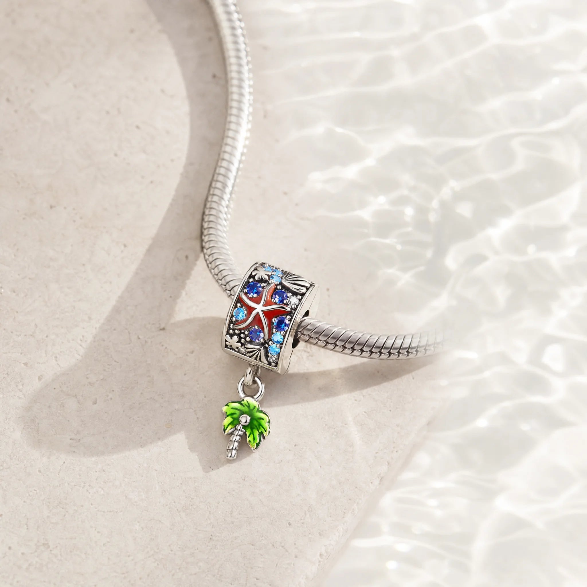 CALEO ocean lifestyle image - Starfish & Palm Tree Dangle Charm - ocean-ref01-starfish-palm-tree-dangle-charm - 2026-07-23