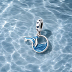 CALEO ocean lifestyle image - Blue Whale Tail Circle Charm - ocean-ref04-blue-whale-tail-circle-charm - 2026-07-23