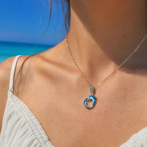 CALEO ocean lifestyle image - Blue Dolphin Circle Charm - ocean-ref05-blue-dolphin-circle-charm - 2026-07-23