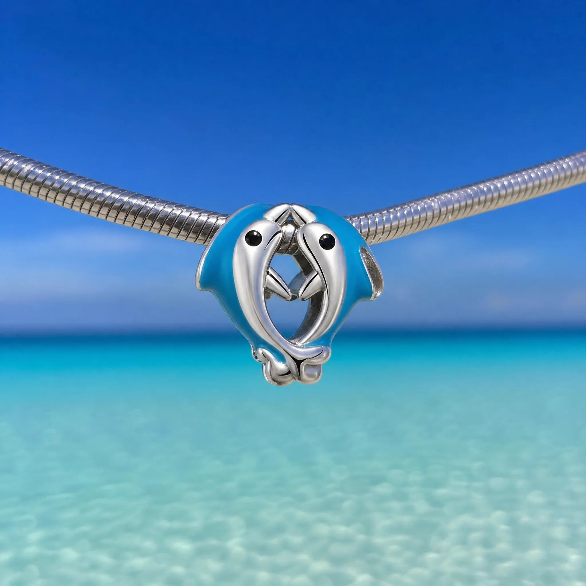 CALEO ocean lifestyle image - Double Dolphin Bead Charm - ocean-ref05-double-dolphin-bead-charm - 2026-07-23