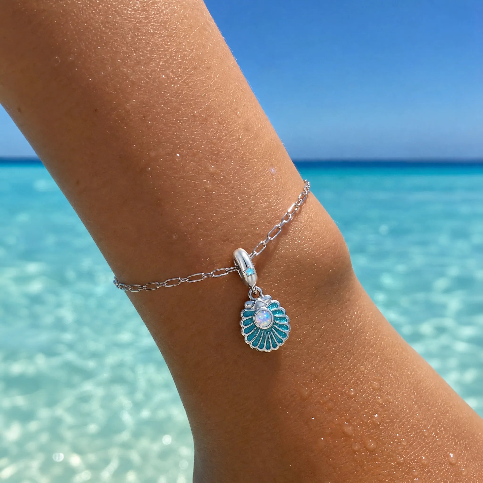 CALEO ocean lifestyle image - Glow-in-the-Dark Opal Seashell Dangle Charm - ocean-ref05-glow-in-the-dark-opal-seashell-dangle-charm - 2026-07-23