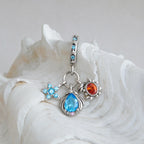 CALEO ocean lifestyle image - Turtle & Sunstone Cluster Charm - ocean-ref08-turtle-sunstone-cluster-charm - 2026-07-23