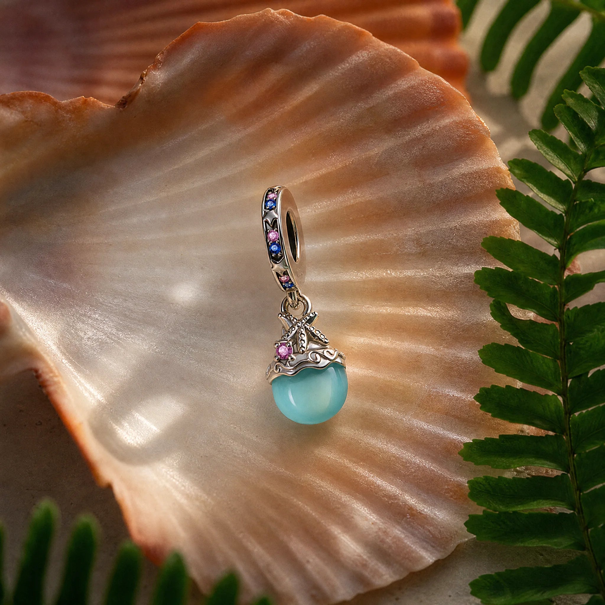 CALEO ocean lifestyle image - Glow-in-the-Dark Mermaid Pearl Dangle Charm - ocean-ref10-glow-in-the-dark-mermaid-pearl-dangle-charm - 2026-07-23