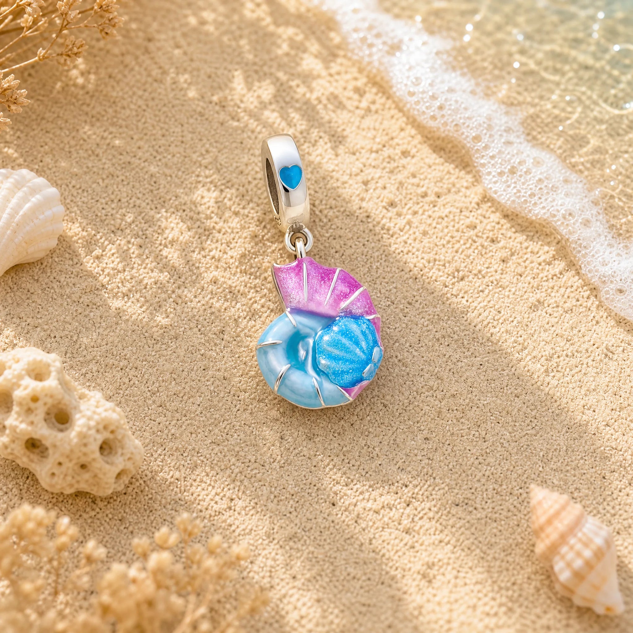 CALEO ocean lifestyle image - Glow-in-the-Dark Pink Seashell Dangle Charm - ocean-ref11-glow-in-the-dark-pink-seashell-dangle-charm - 2026-07-23