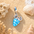 CALEO ocean lifestyle image - Glow-in-the-Dark Seashell & Ship Dangle Charm - ocean-ref11-glow-in-the-dark-seashell-ship-dangle-charm - 2026-07-23