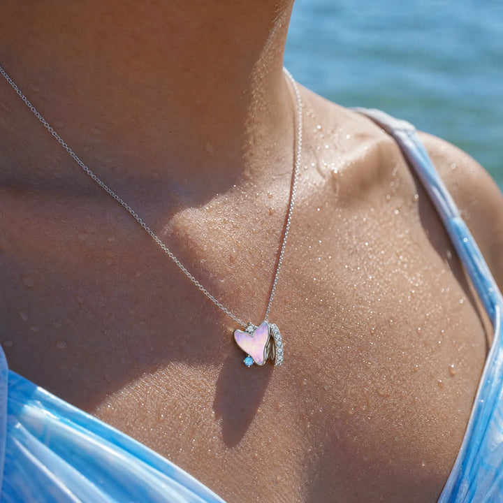 CALEO ocean lifestyle image - Opal Mermaid Tail Charm - ocean-ref15-opal-mermaid-tail-charm - 2026-07-23