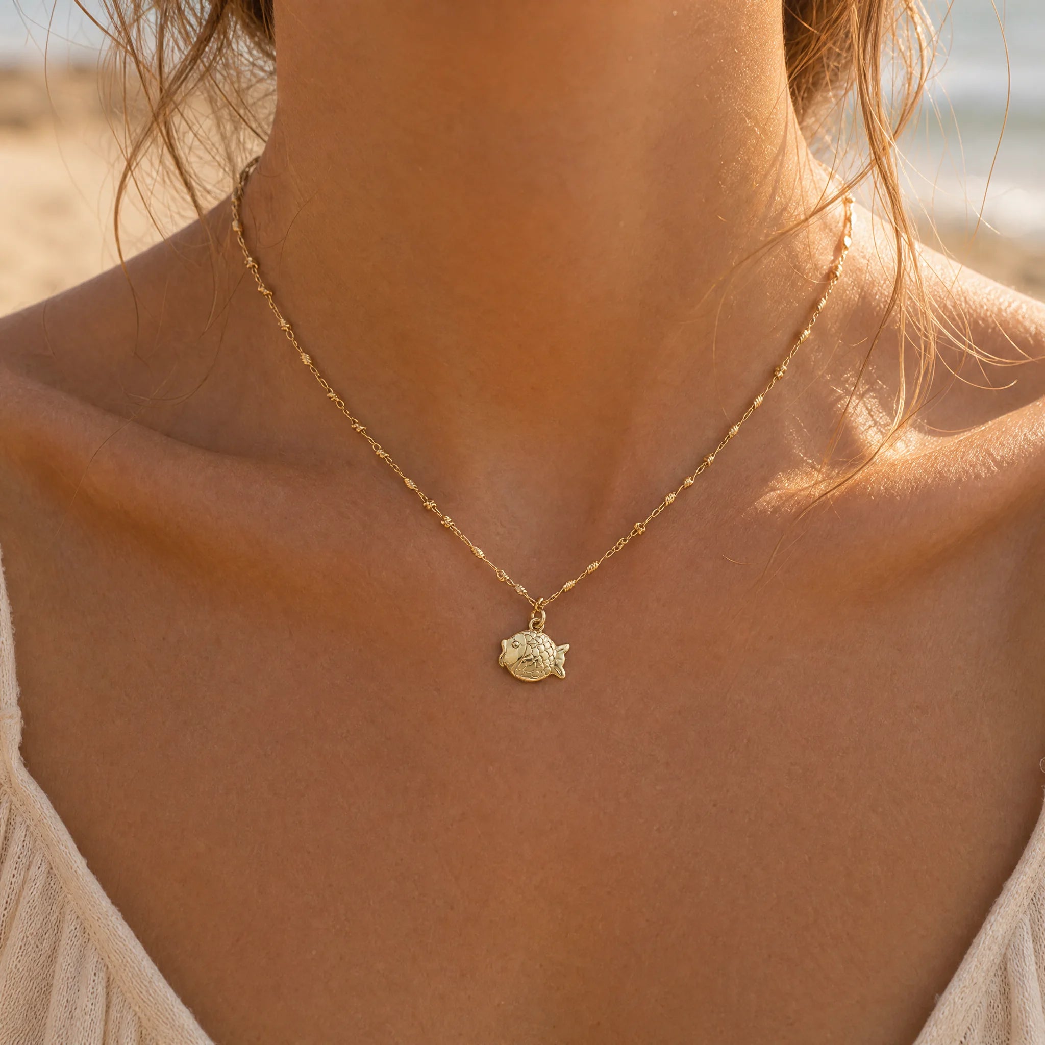 CALEO ocean lifestyle image - Gold Sea Turtle Pendant Charm - ocean-ref17-gold-sea-turtle-pendant-charm - 2026-07-23