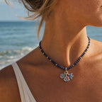 CALEO ocean lifestyle image - Nautical Wheel & Sailboat Cluster Charm - ocean-ref18-nautical-wheel-sailboat-cluster-charm - 2026-07-23