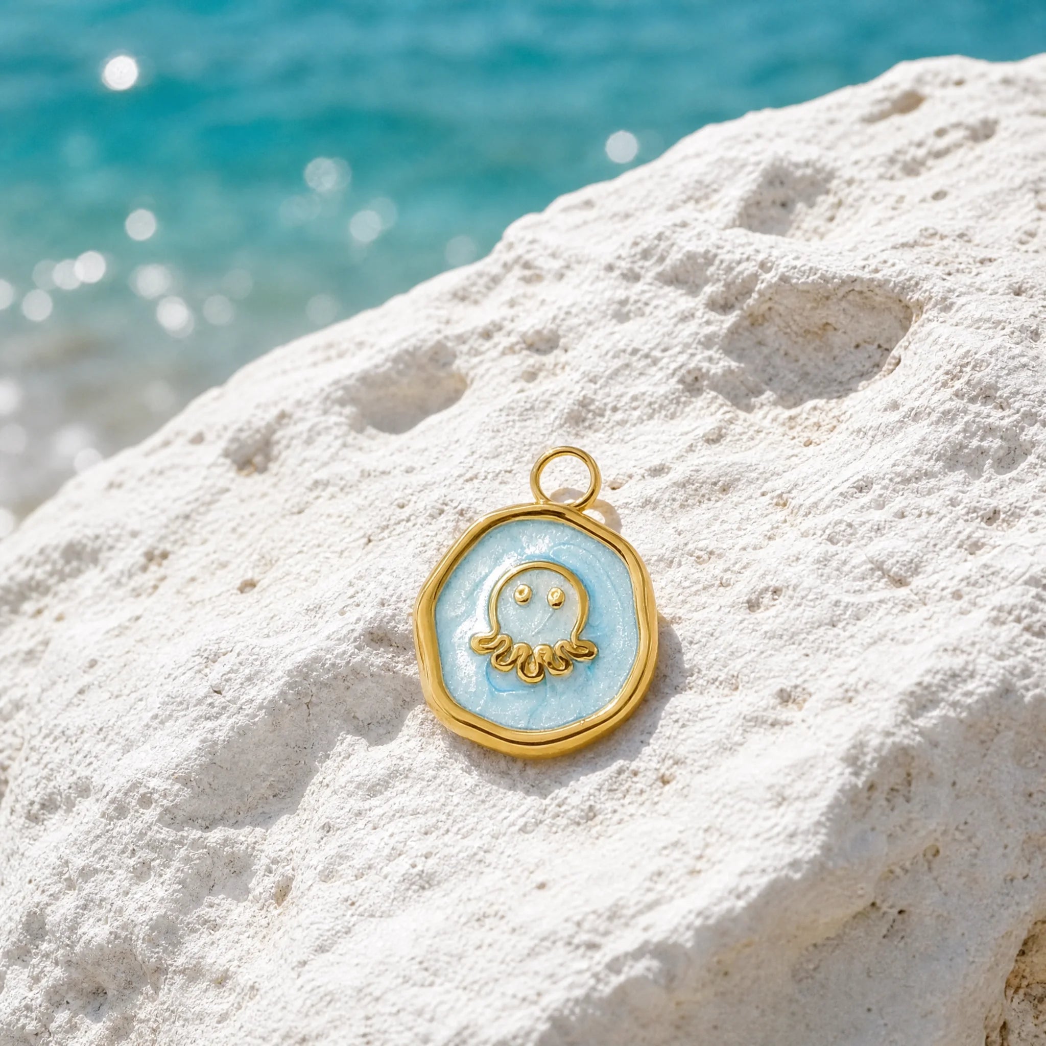 CALEO ocean lifestyle image - Gold Blue Octopus Medallion Pendant Charm - ocean-ref19-gold-blue-octopus-medallion-pendant-charm - 2026-07-23
