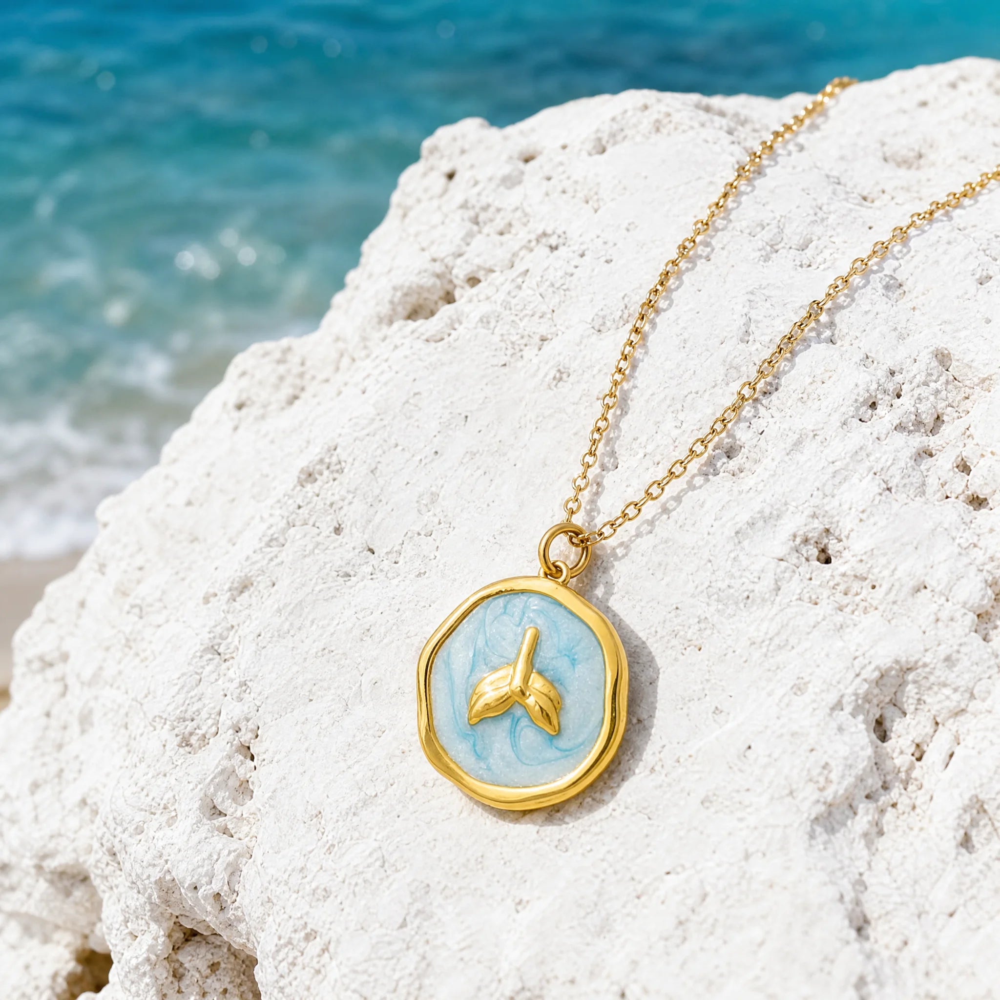 CALEO ocean lifestyle image - Gold Blue Whale Tail Medallion Pendant Charm - ocean-ref19-gold-blue-whale-tail-medallion-pendant-charm - 2026-07-23