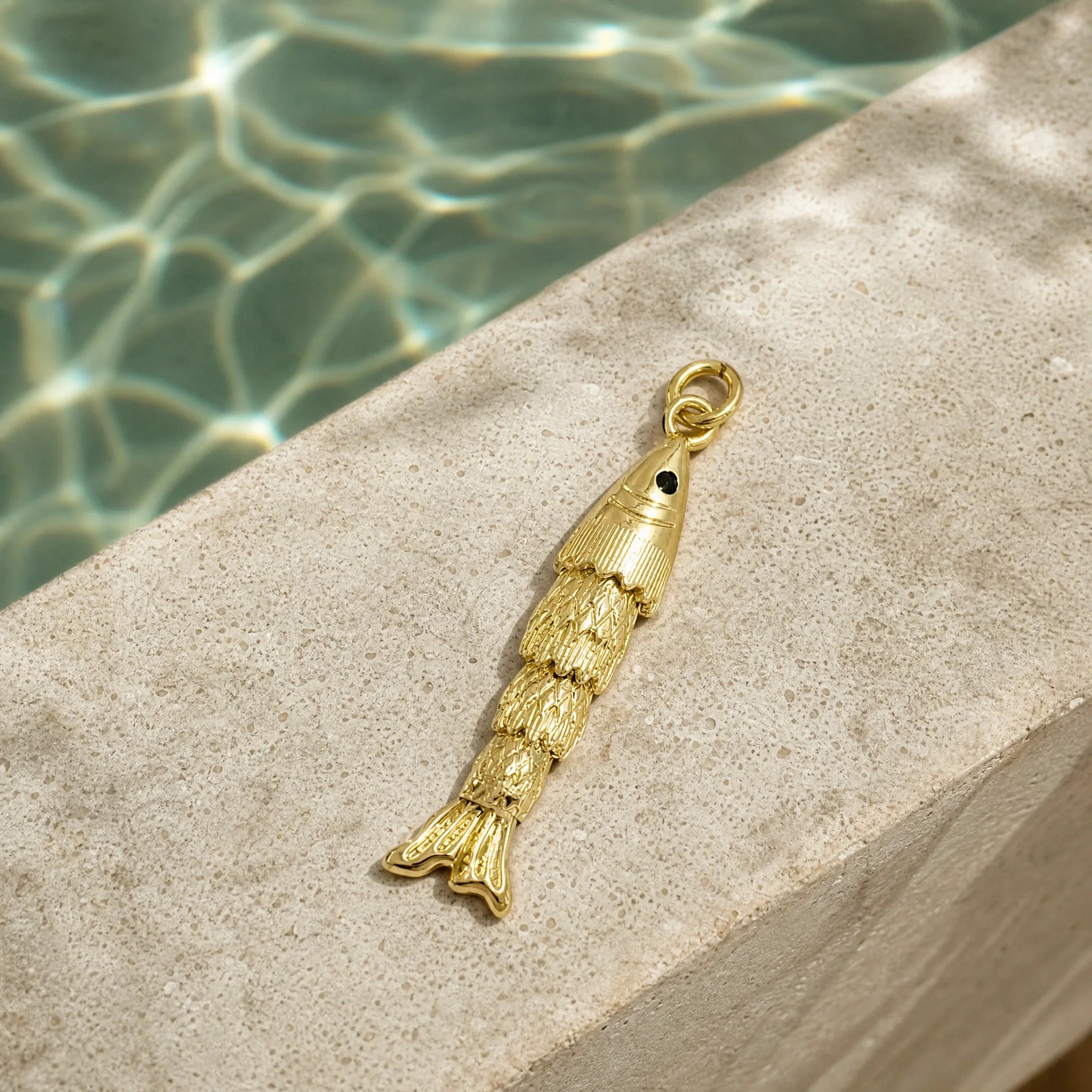 CALEO ocean lifestyle image - Gold Ocean Fish Pendant Charm - ocean-ref20-gold-ocean-fish-pendant-charm - 2026-07-23