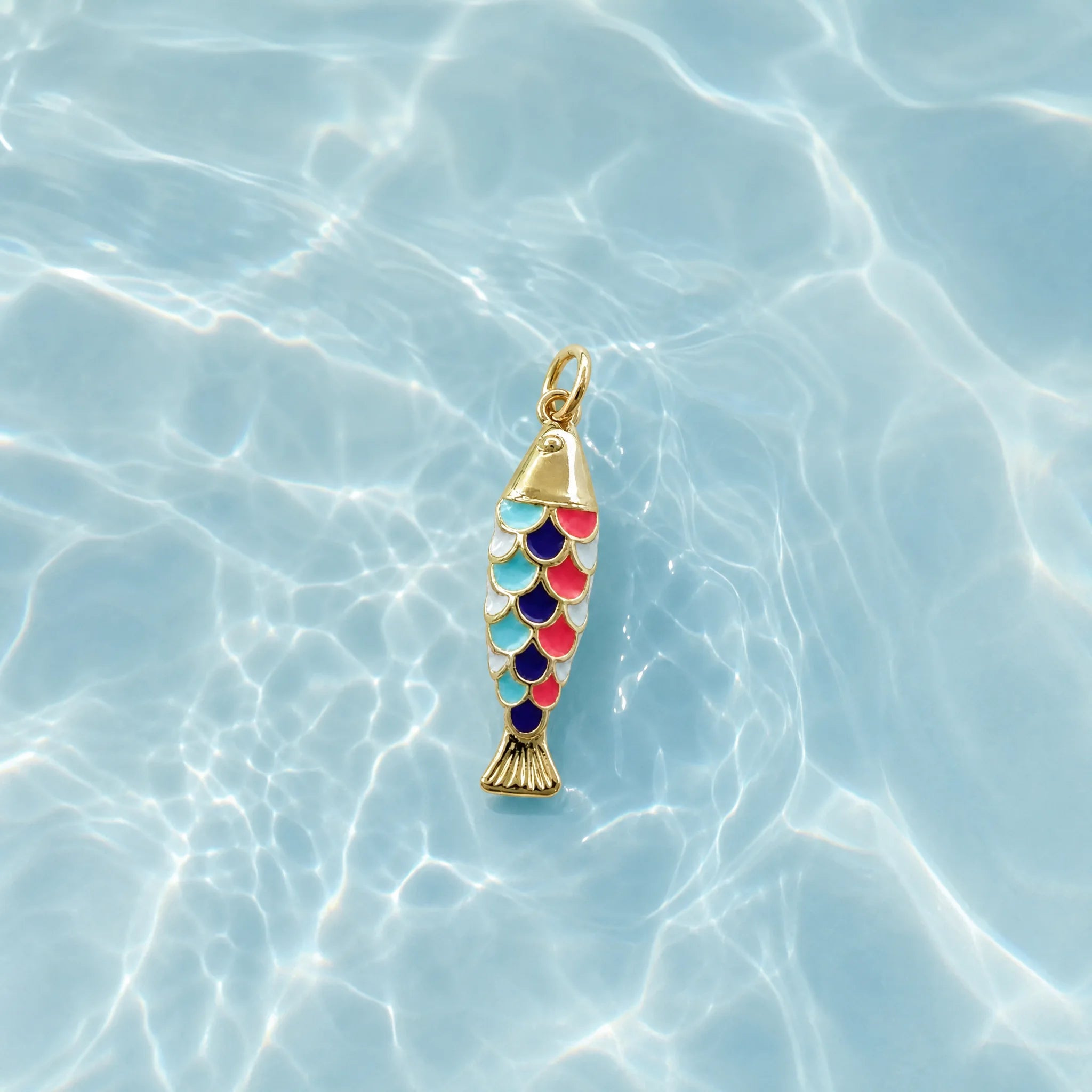 CALEO ocean lifestyle image - Gold Pastel Scale Fish Pendant Charm - ocean-ref21-gold-pastel-scale-fish-pendant-charm - 2026-07-23