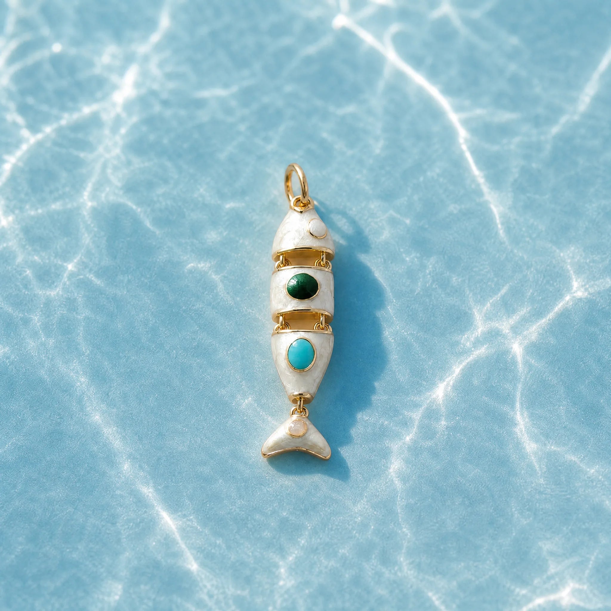 CALEO ocean lifestyle image - Gold White Fish Pendant Charm - ocean-ref21-gold-white-fish-pendant-charm - 2026-07-23