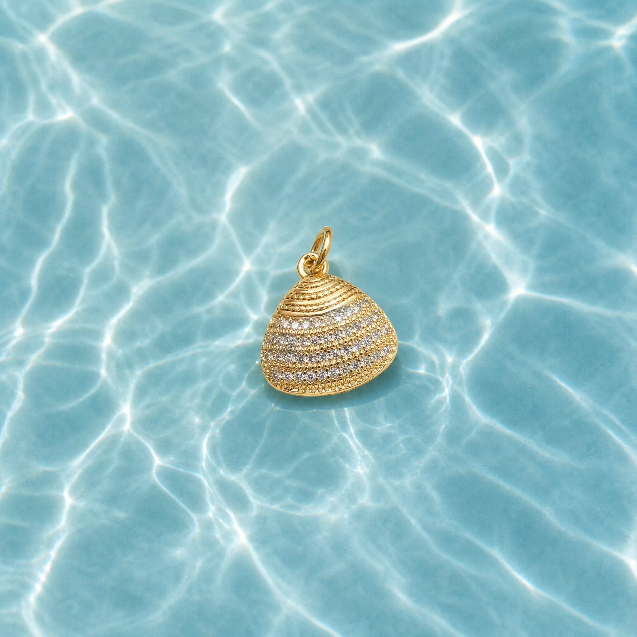 CALEO ocean lifestyle image - Striped Crystal Clam Shell Dangle Charm - ocean-ref21-striped-crystal-clam-shell-dangle-charm - 2026-07-23