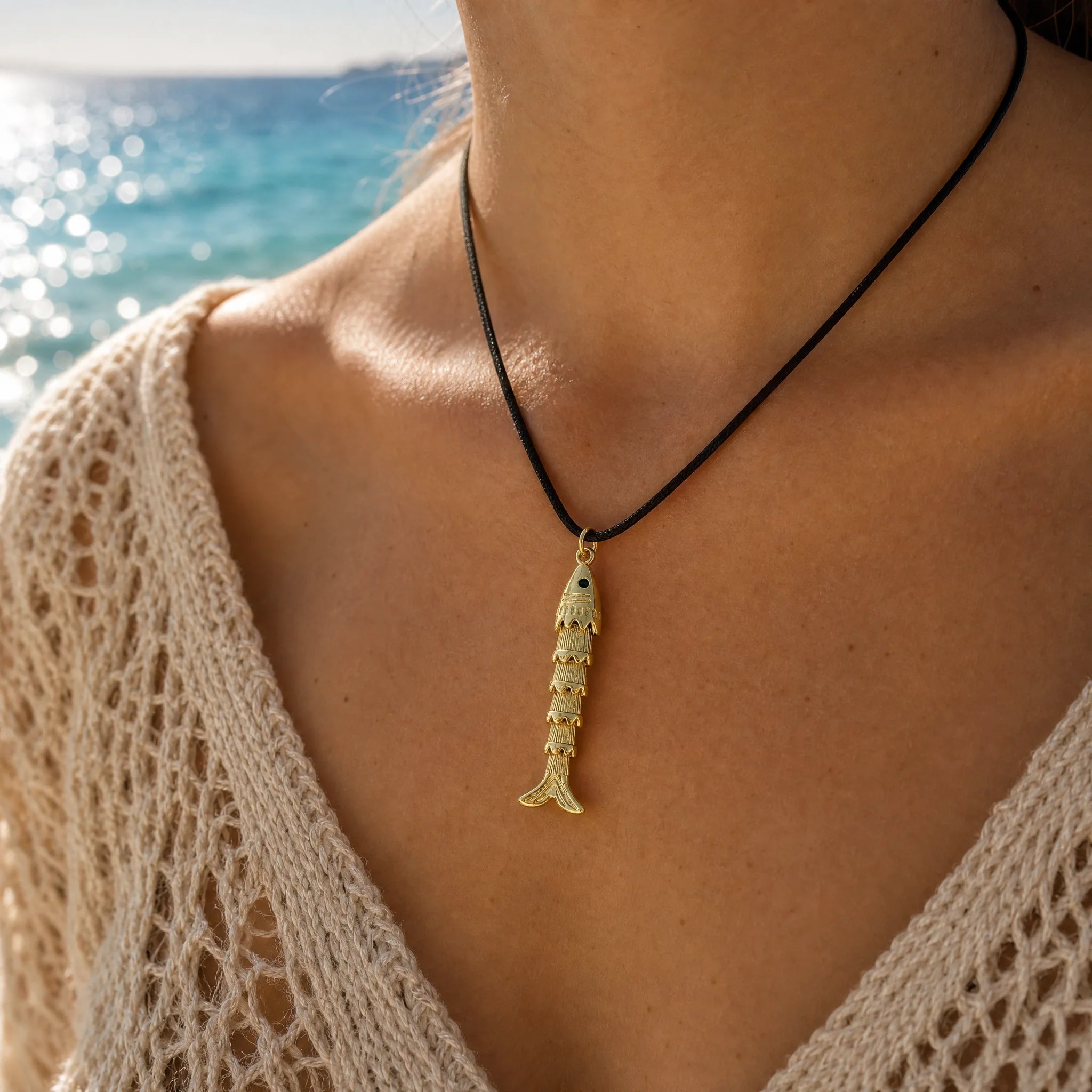 CALEO ocean lifestyle image - Gold Long Textured Fish Pendant Charm - ocean-ref22-gold-long-textured-fish-pendant-charm - 2026-07-23