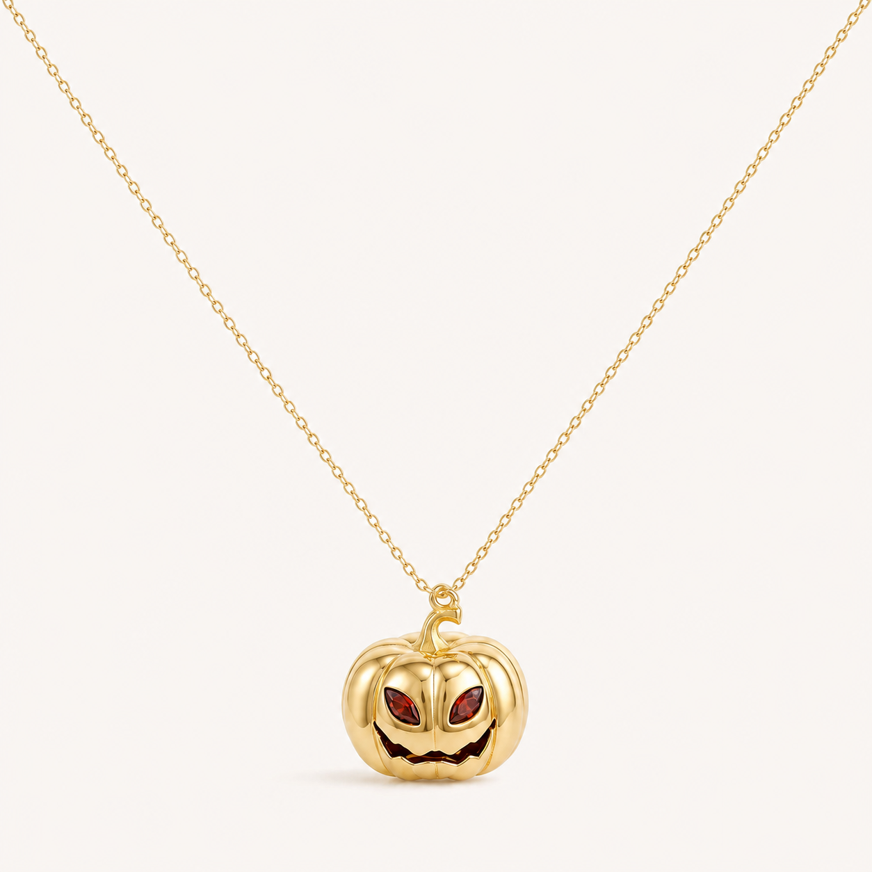 Personalised Halloween Birthstone Pumpkin Necklace with January Garnet eyes