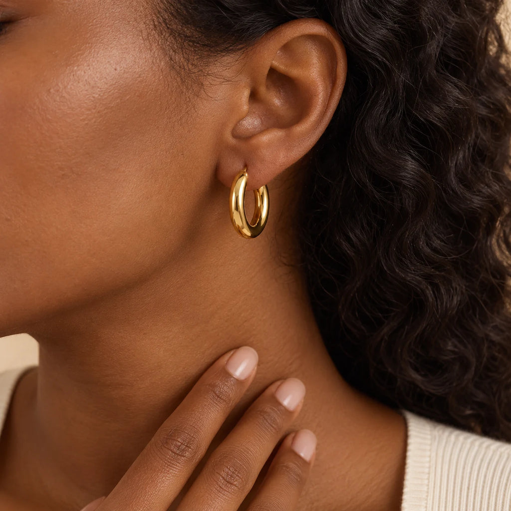 Polished Curve Hoops - lifestyle gold hand