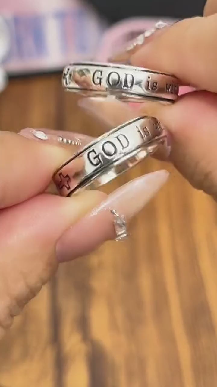 The She Will Not Fall Ring worn and shown from several angles