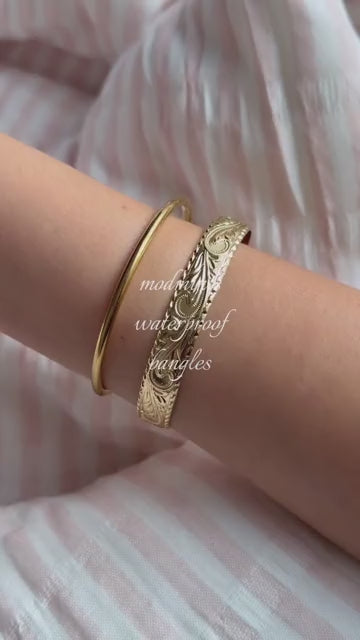 Aurelia Essential Bangle in an everyday flatlay
