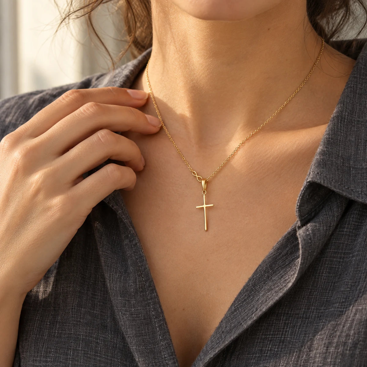 Quiet Grace Cross Necklace - lifestyle gold hand charcoal