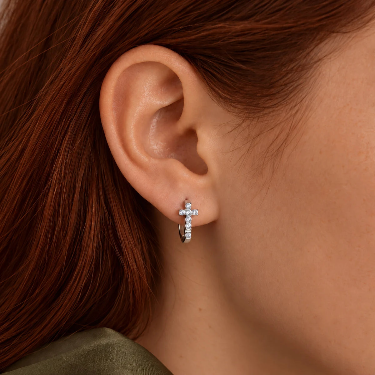 Radiant Cross Huggie Hoops - lifestyle ear silver
